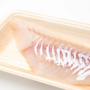 Cod fillets on a plastic tray